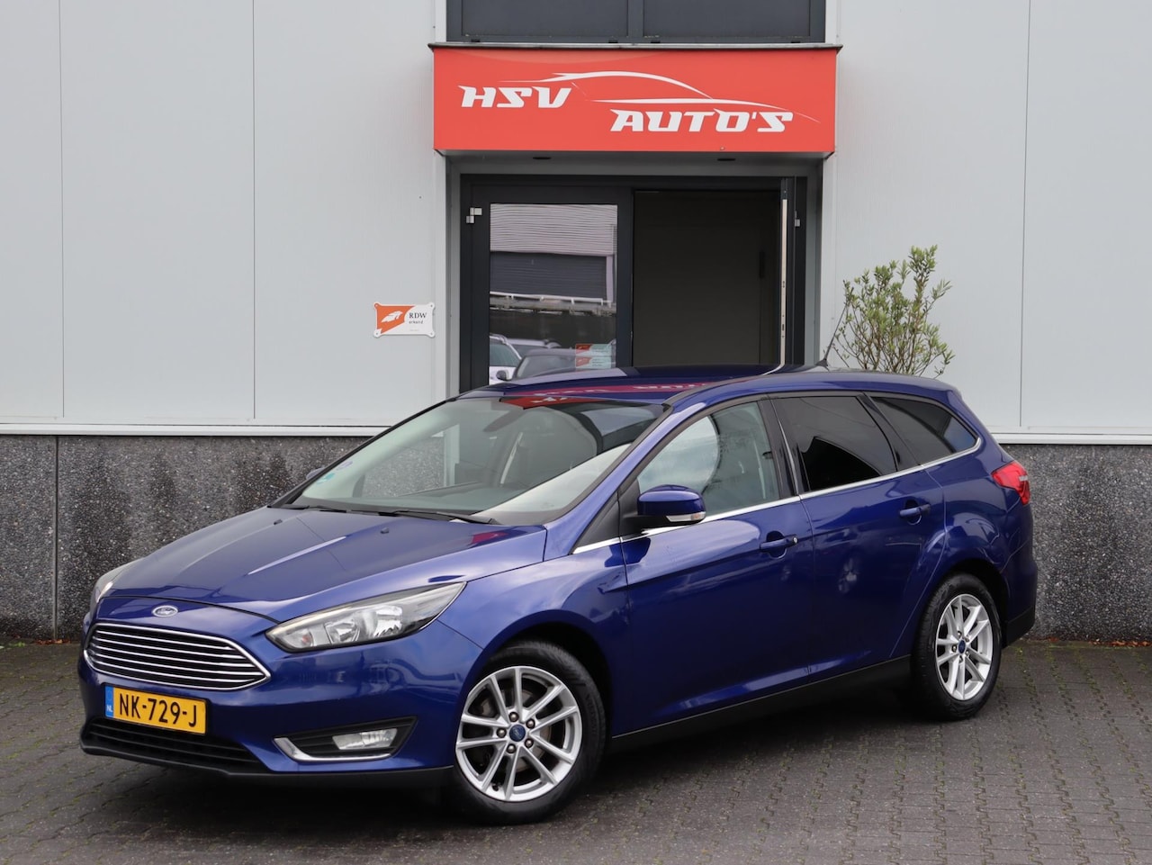 Ford Focus Wagon - 1.0 Titanium navi LM airco cruise - AutoWereld.nl