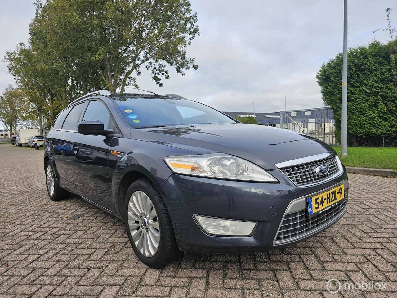 Ford Mondeo Wagon - 2.0-16V Titanium FlexiFuel Eerst Eigenaar - AutoWereld.nl
