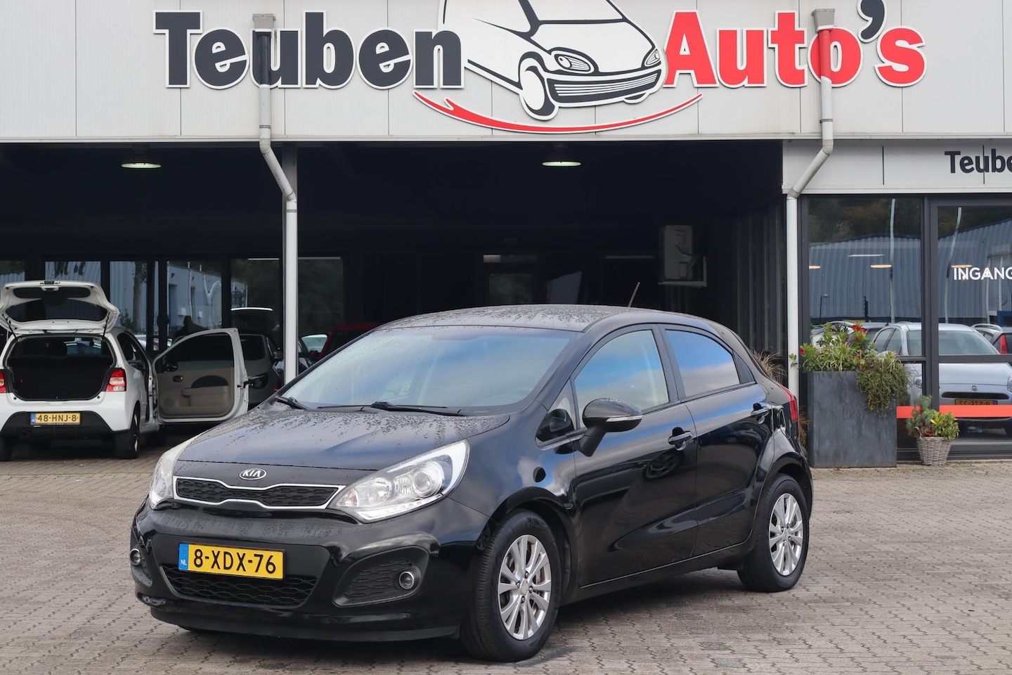 Kia Rio - 1.2 CVVT World Cup Edition Plus Airco, Cruise control, Lichtmetalen wielen, Elektrische ra - AutoWereld.nl