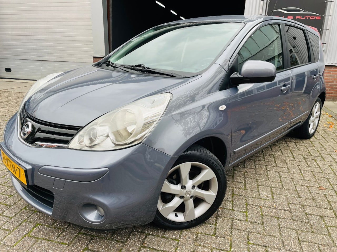 Nissan Note - 1.6 Acenta 15'LMV PDC AIRCO NAVI BLUETOOTH - AutoWereld.nl