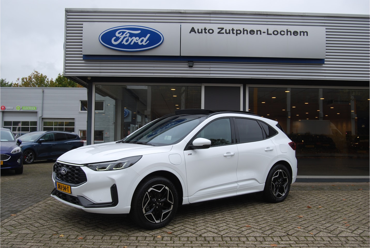 Ford Kuga - 2.5 PHEV 243pk ST-Line ELEKTR.TREKHAAK 2100KG | PANO.DAK | WINTERPACK | HUD | 19" VELGEN | - AutoWereld.nl