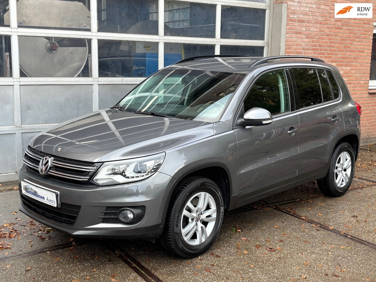 Volkswagen Tiguan - 2.0 TSI Sport&Style 4Motion,AUTOMAAT,XENON,STOEL VERW,LMV,109852 km - AutoWereld.nl