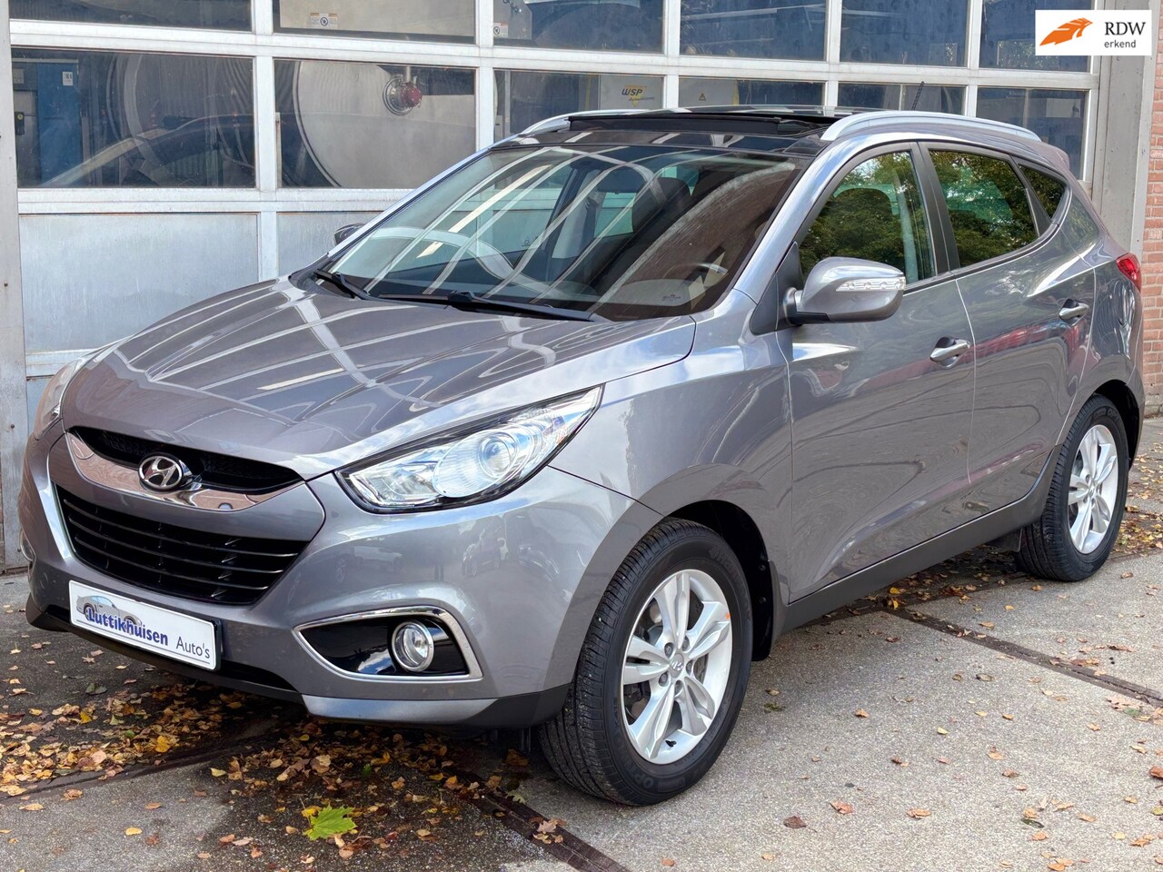 Hyundai ix35 - 2.0i 4WD i-Catcher 2.0i 4WD i-Catcher,LEER,CAMERA,NAVI,PANO,CLIMAT,STOELVERW - AutoWereld.nl