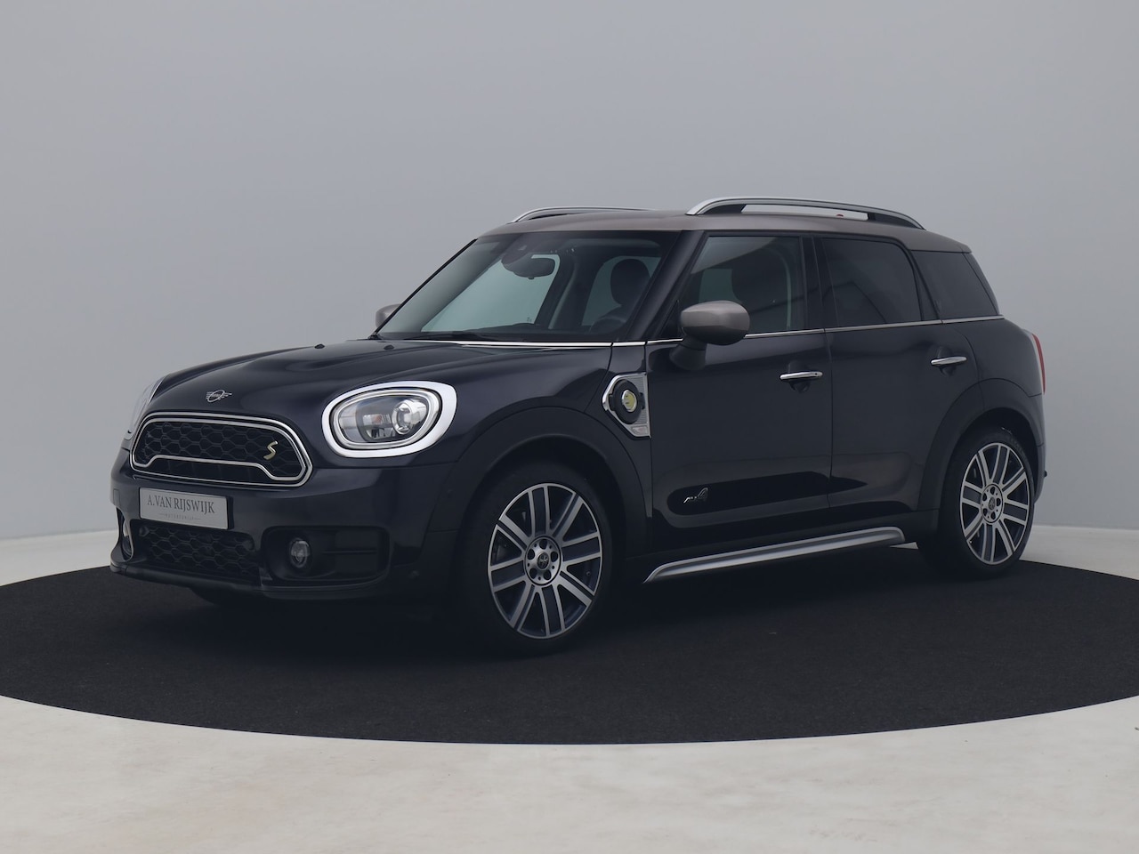 MINI Countryman - Mini 1.5 Cooper S E ALL4 Business Edition | HUD | CARPLAY | KEYLESS | STOELVERWARMING - AutoWereld.nl