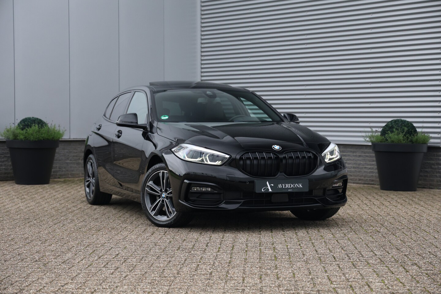 BMW 1-serie - 118i Executive Sportline NAP|Pano|Trekh|Cam|Leder|Sportst - AutoWereld.nl
