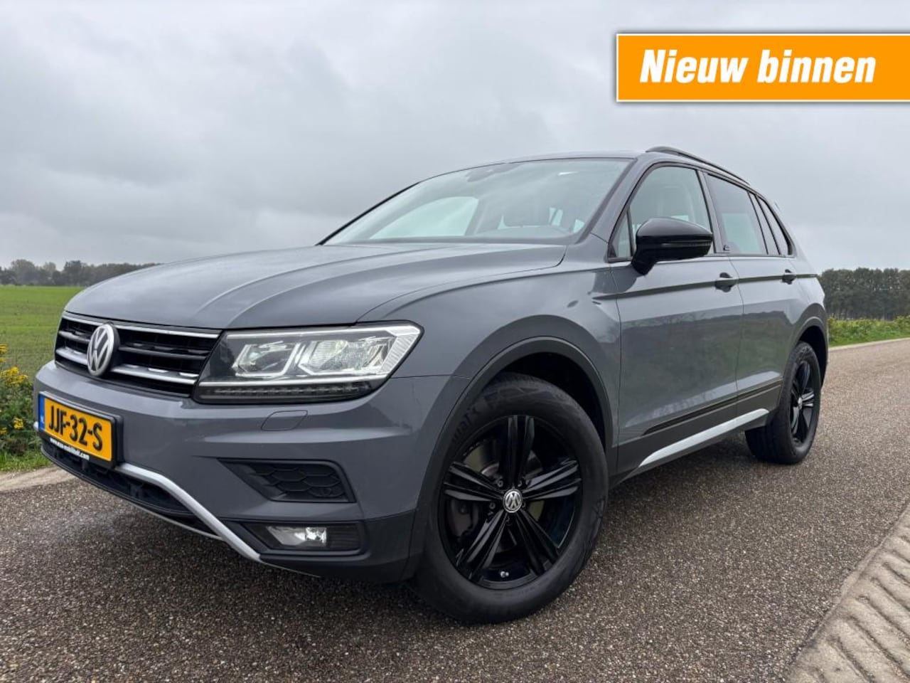 Volkswagen Tiguan - 2.0 TSI 4M. HIGHLINE / AUTOMAAT / PANO / BOMVOLL - AutoWereld.nl
