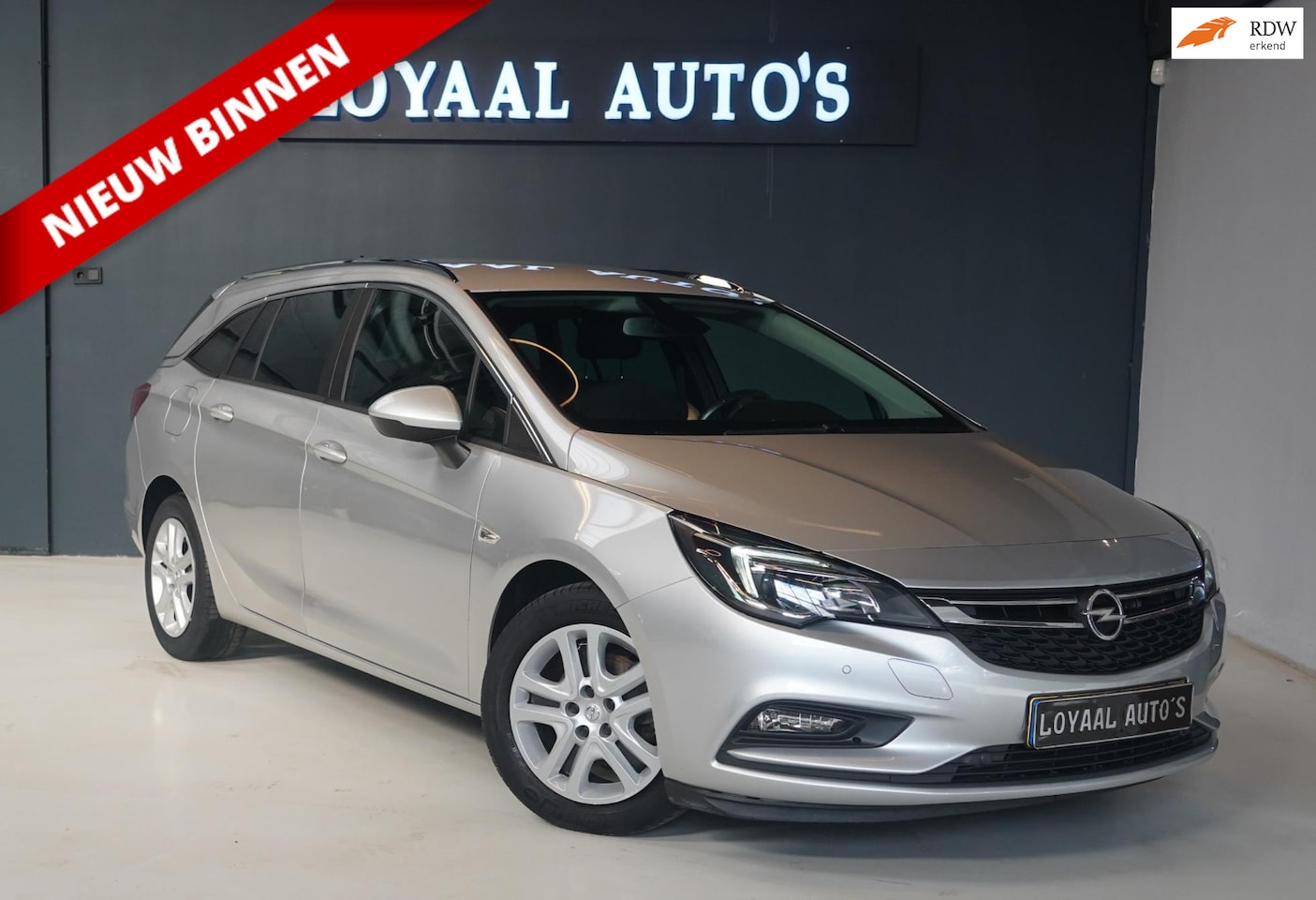 Opel Astra Sports Tourer - 1.0 Turbo 120 Jaar Edition | NAVI | CRUISE | AIRCO | PDC | APK - AutoWereld.nl