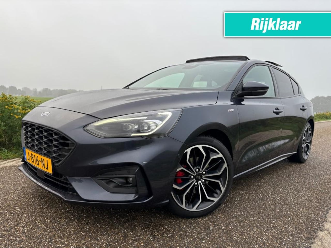 Ford Focus - 1.0 EBH ST L. XBNS / BOMVOL / PANO / HEAD UP - AutoWereld.nl