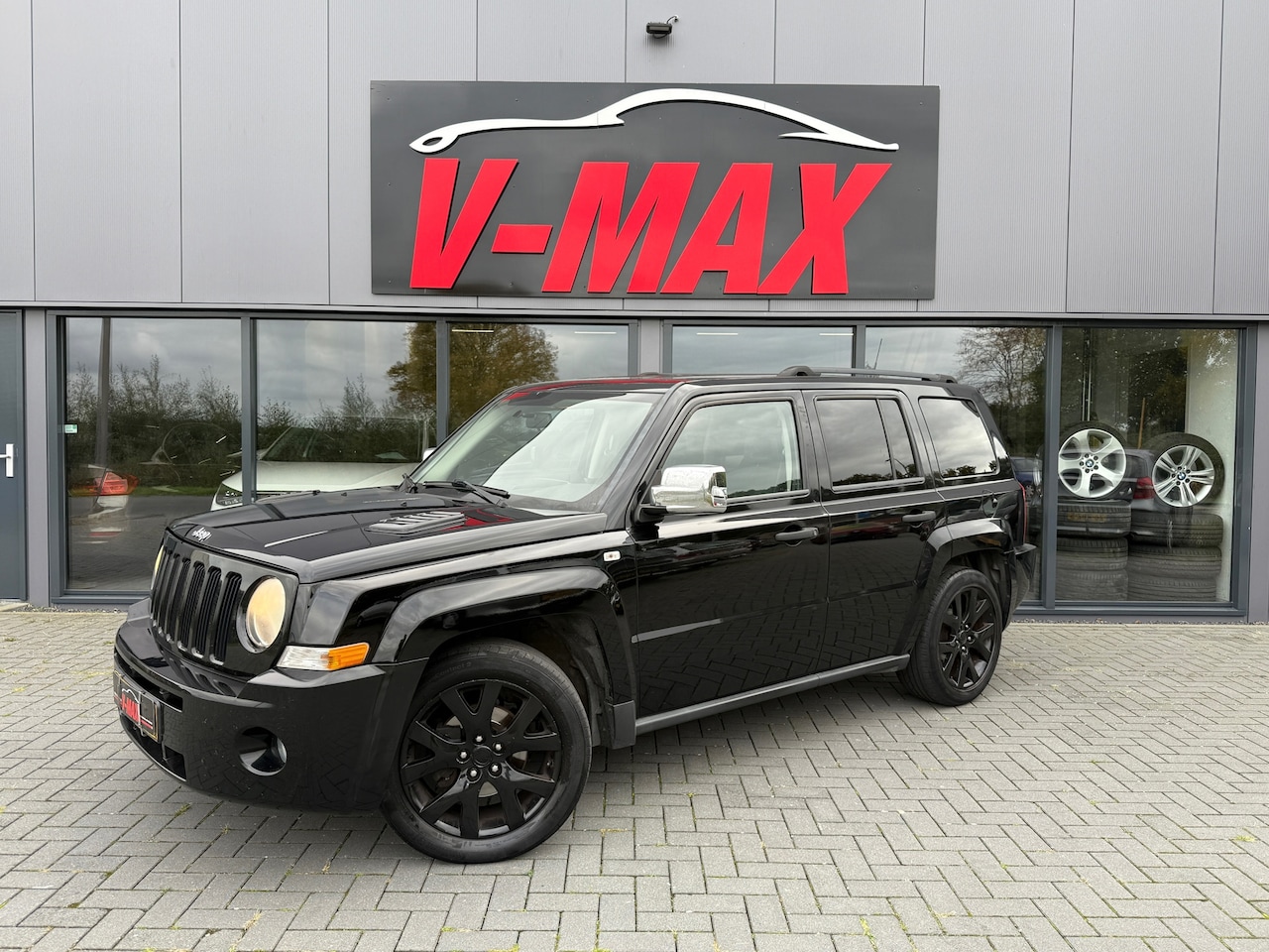 Jeep Patriot - 2.4 Limited 4WD Boston Audio Airco Cruise Navi - AutoWereld.nl
