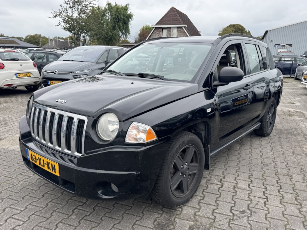 Jeep Compass - 2.4 Limited LPG-G3 2007 Zwart - AutoWereld.nl