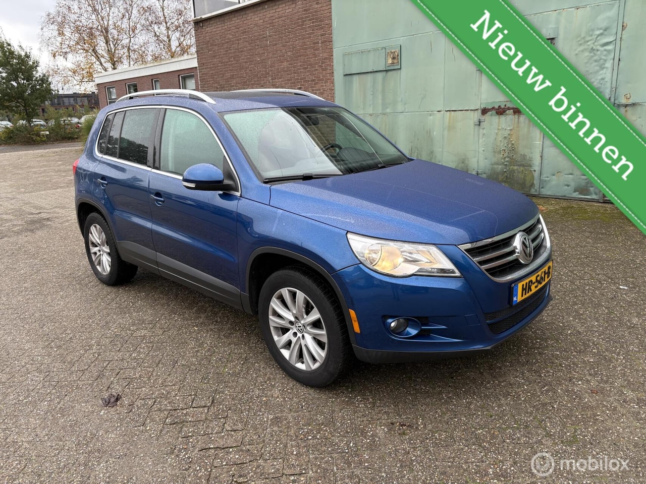 Volkswagen Tiguan - 2.0 TSI Sport&Style 4Motion - AutoWereld.nl