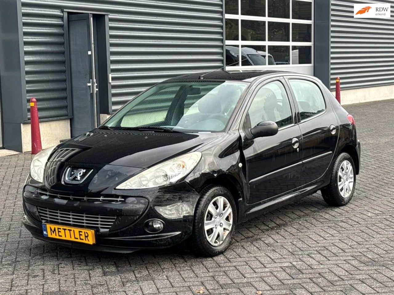 Peugeot 206 - 1.4 Millesim 200, airco - AutoWereld.nl