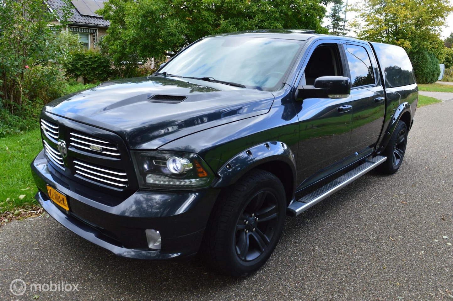 Dodge Ram 1500 - 5.7 V8 Quad Cab 6'4 5.7 V8 Quad Cab 6'4 - AutoWereld.nl