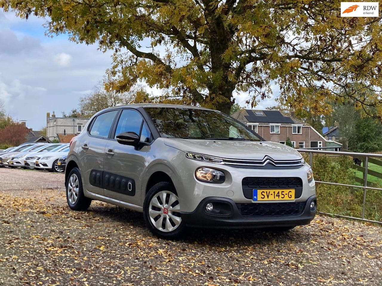 Citroën C3 - 1.2 PureTech Feel | Cruise + Clima + Navi nu € 6.975,-!!! - AutoWereld.nl