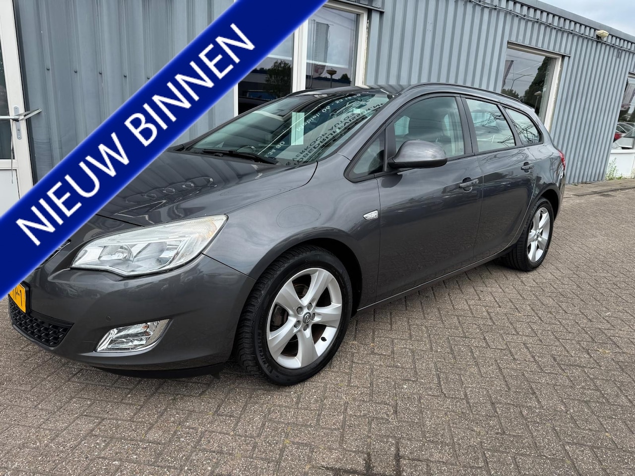 Opel Astra Sports Tourer - 1.4 Turbo Edition 1.4 Turbo Edition - AutoWereld.nl