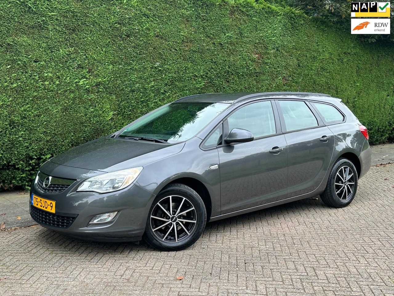 Opel Astra Sports Tourer - 1.4 Turbo Edition /CRUISE/AIRCO/VELGEN/RIJDTGOED/ - AutoWereld.nl