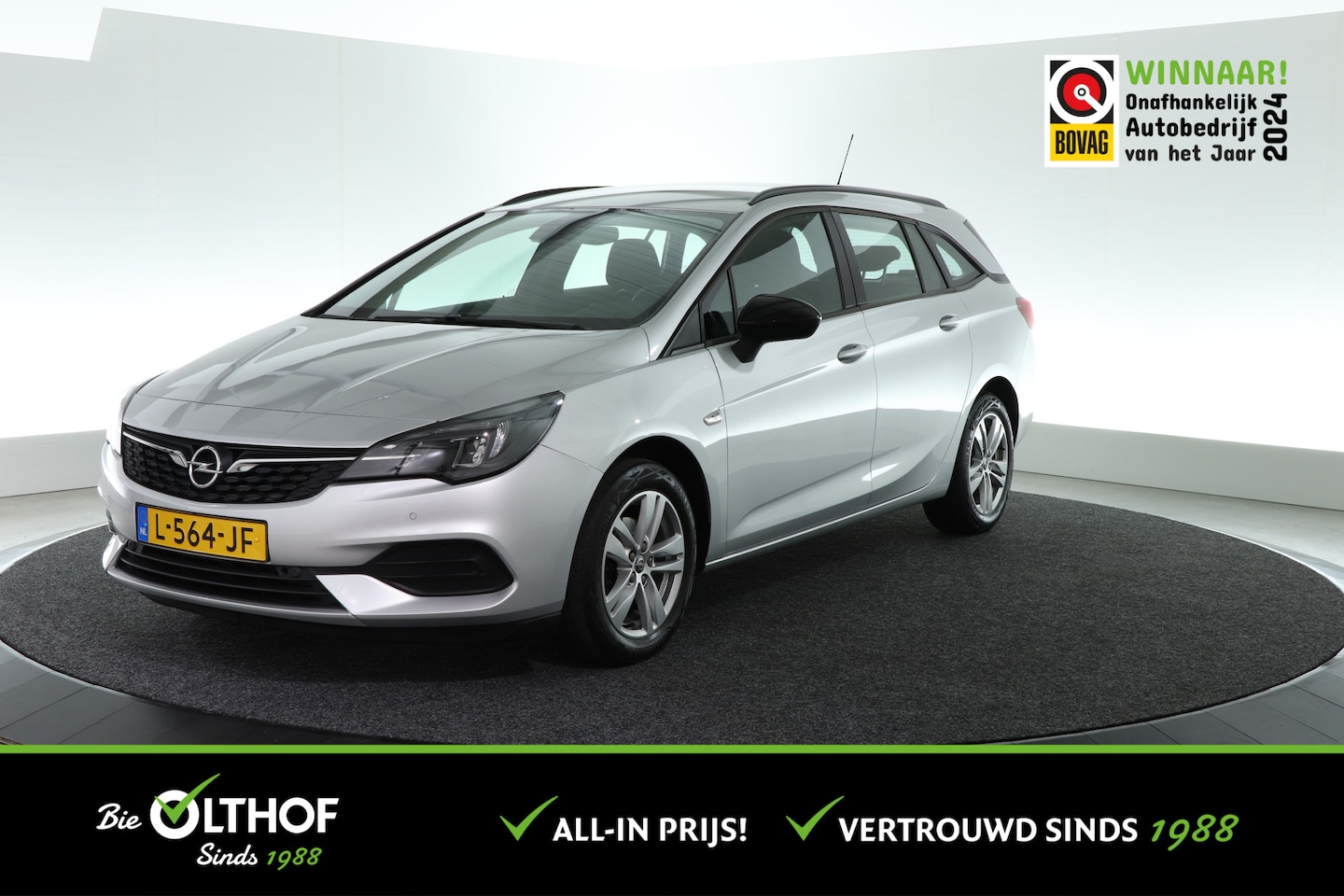 Opel Astra Sports Tourer - 1.2 Edition | TREKHAAK | NAVI | AIRCO | PDC | CARPLAY | - AutoWereld.nl