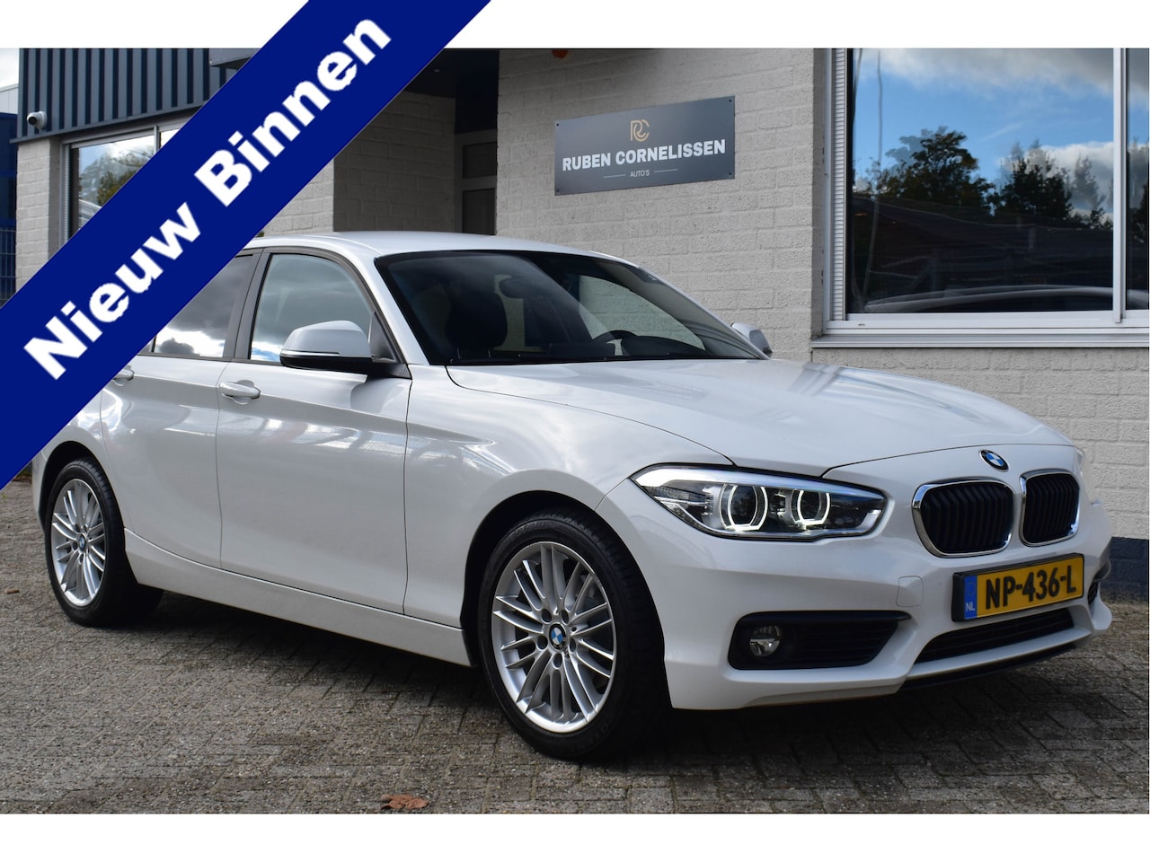 BMW 1-serie - 118i Executive | Xenon | Navi. Prof | Aut. | NL AUTO | 17 inch - AutoWereld.nl