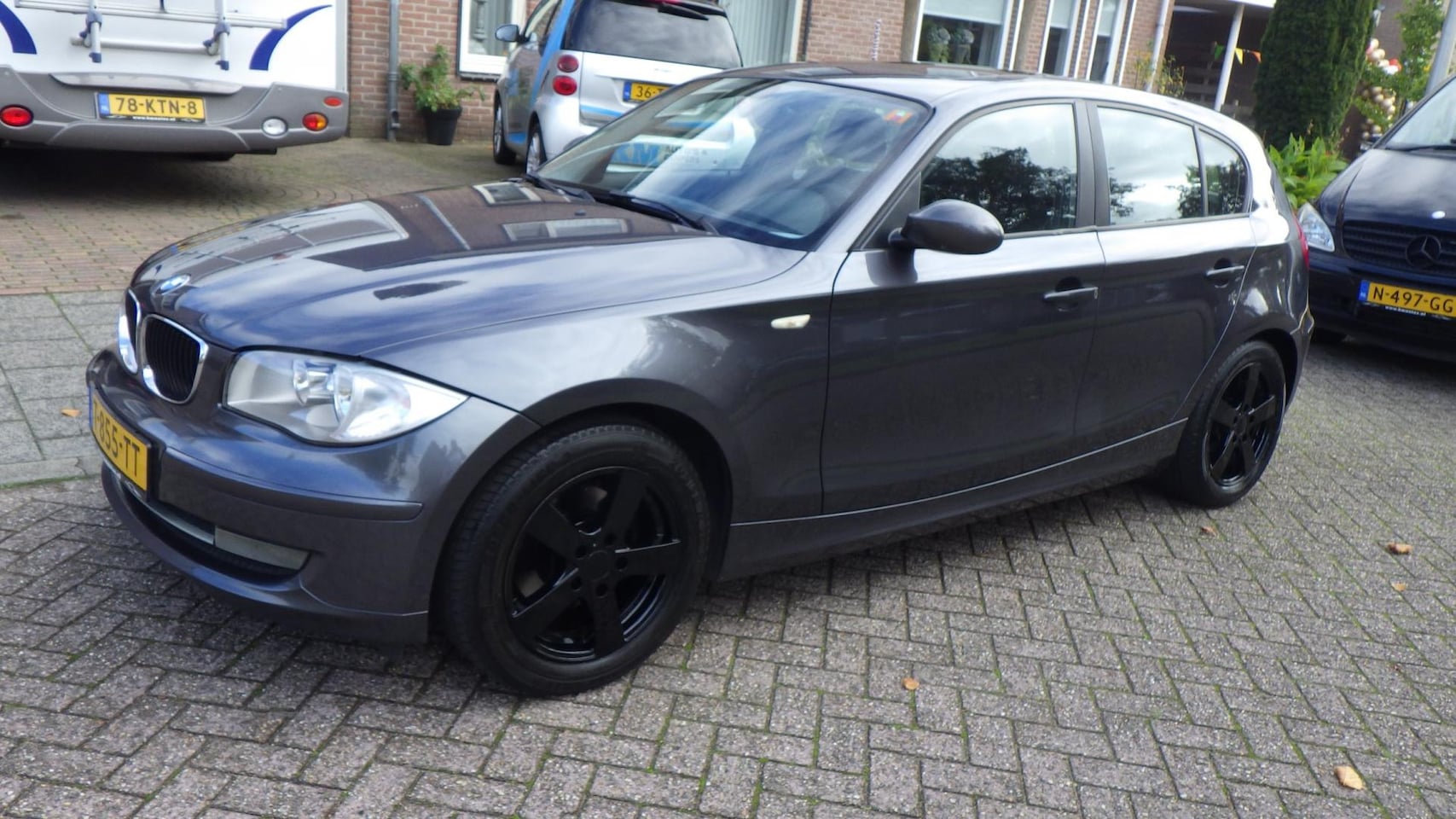 BMW 1-serie - 118i super nette youngtimer stoelverwarming heerlijk inr mog - AutoWereld.nl