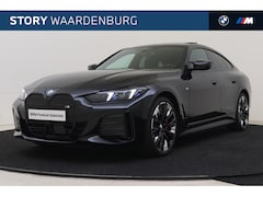 BMW i4 - M50 High Executive / Schuif-kanteldak / Trekhaak / M Adaptief onderstel / Adaptieve LED /