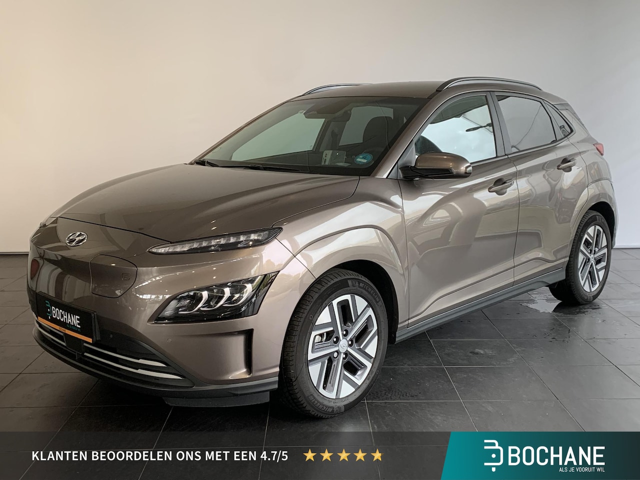 Hyundai Kona Electric - EV Premium 64 kWh NAVIGATIE | TREKHAAK | ACHTERUITRIJCAMERA | LEDEREN BEKLEDING - AutoWereld.nl