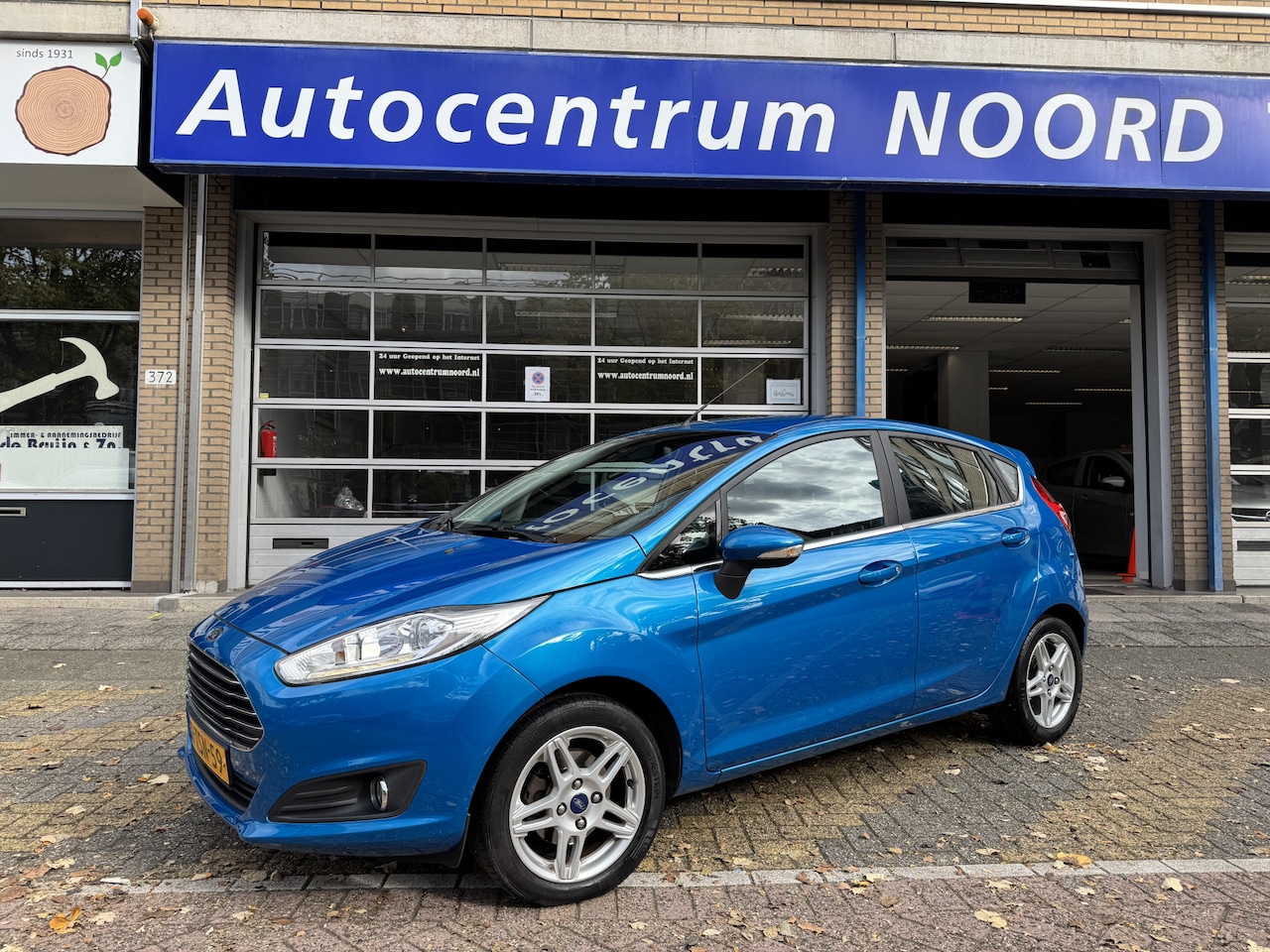 Ford Fiesta - 1.0 EcoBoost Titanium 79178KM! NAP | Nieuwe Distributieriem | Navigatie | Climate Control - AutoWereld.nl