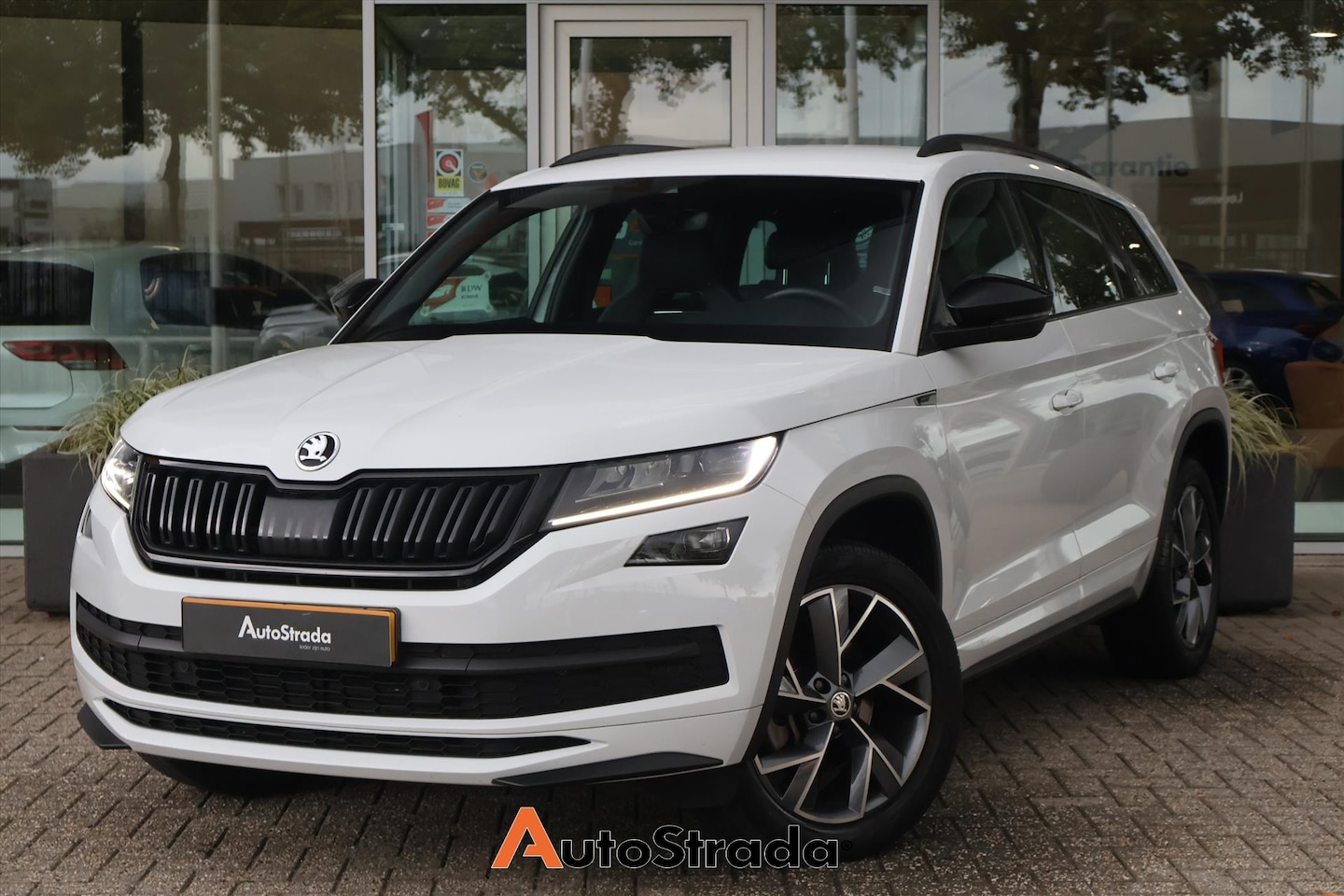 Skoda Kodiaq - 1.5 SportLine TSI 150pk DSG | 7-Pers | Virtual | Camera | LED | Canton | Stoelverwarming | - AutoWereld.nl