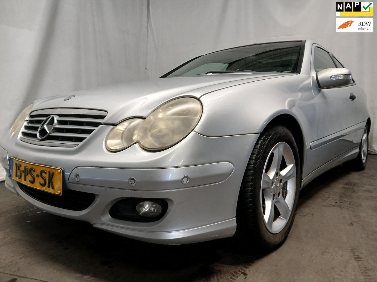Mercedes-Benz C-klasse Sportcoupé - 180 K. - Airco - Cruise - Schade - AutoWereld.nl