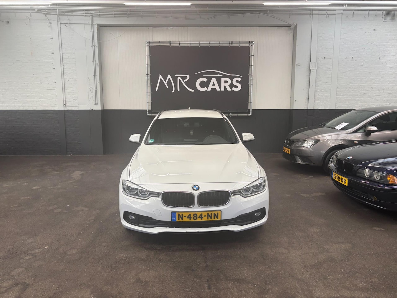 BMW 3-serie Touring - 320d High Executive clima/navi - AutoWereld.nl