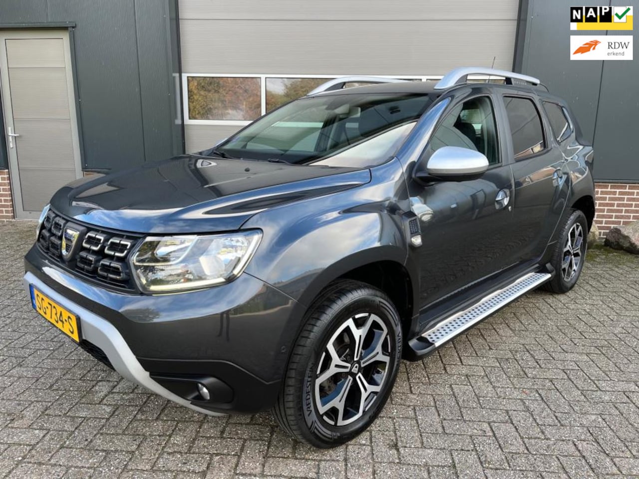 Dacia Duster - 1.2 TCe Prestige-Leder-Trekhaak-360Camera-Navi-PDC! - AutoWereld.nl