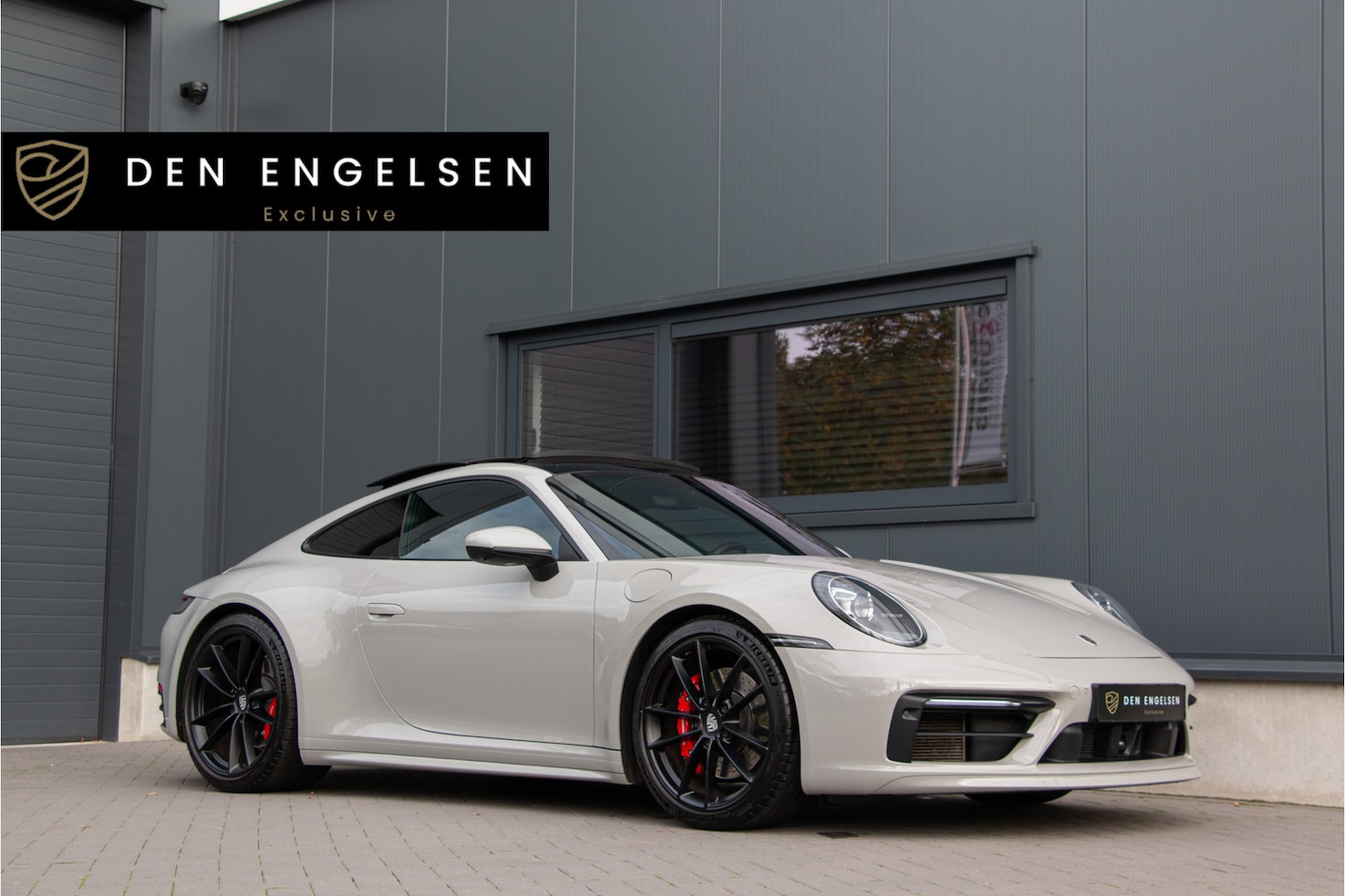Porsche 911 - 3.0 Carrera 4S 450PK | ACC | Lift | 360 Cam | Sportdesign | PDLS+ | Krijt Grijs Sportuitla - AutoWereld.nl
