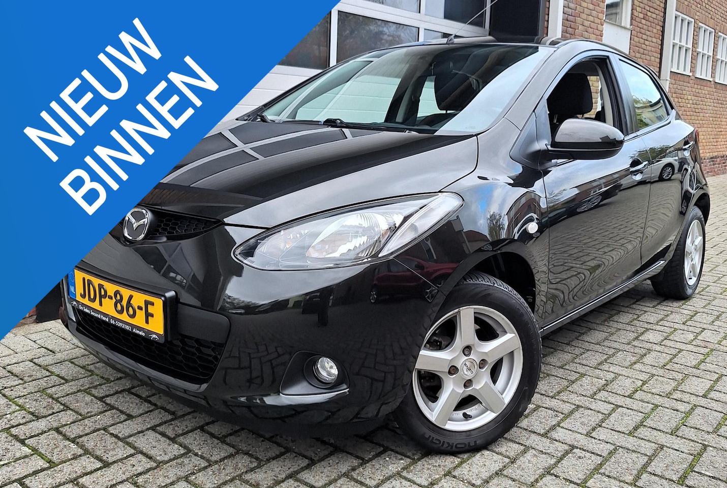 Mazda 2 - 1.3 TS 11-2010 Zwart/Bruin 5deurs 72000 km LMV CV Nw Apk - AutoWereld.nl