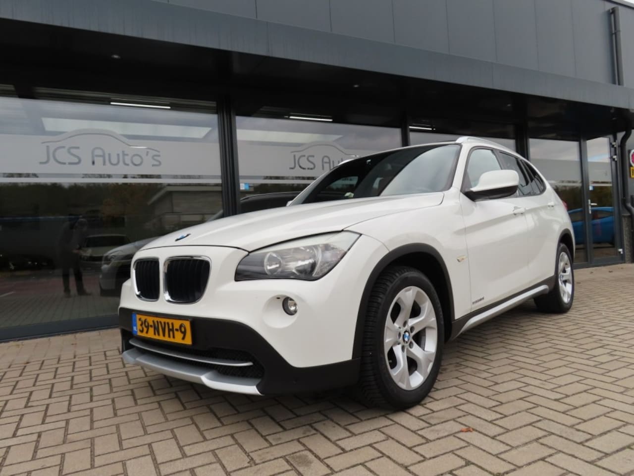 BMW X1 - SDrive 18i Executive Aut. Ecc Leder Pano Trekhaak 2010 - AutoWereld.nl