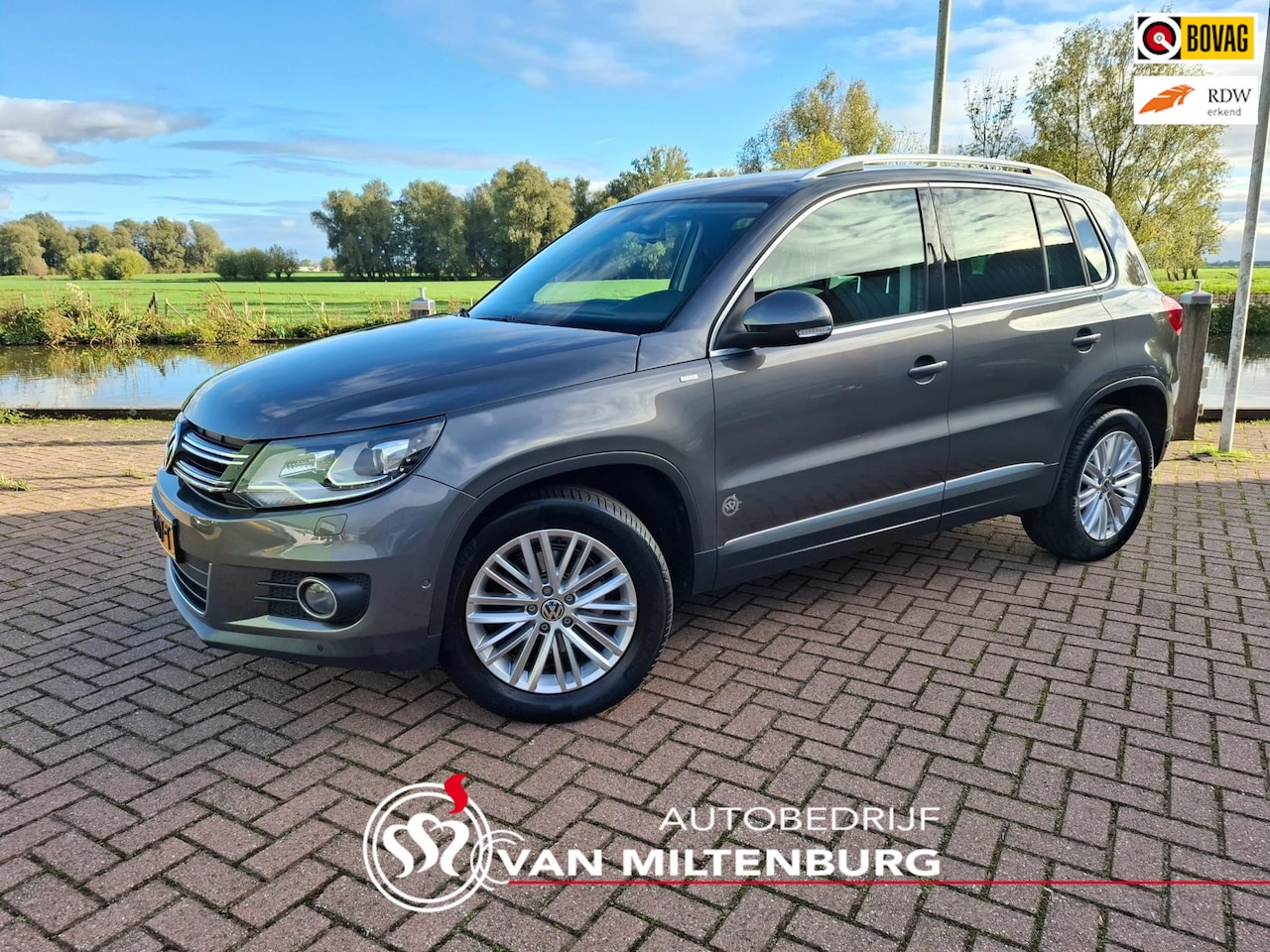Volkswagen Tiguan - 1.4 TSI Sport&Style Clima Stoelverw. PDC V+A - AutoWereld.nl