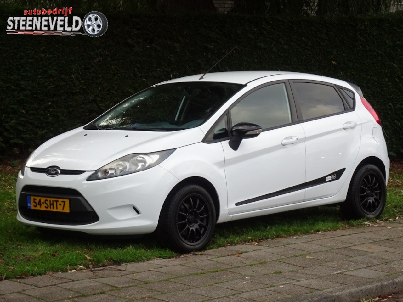 Ford Fiesta - 1.25 Limited Black & White met Airco - AutoWereld.nl