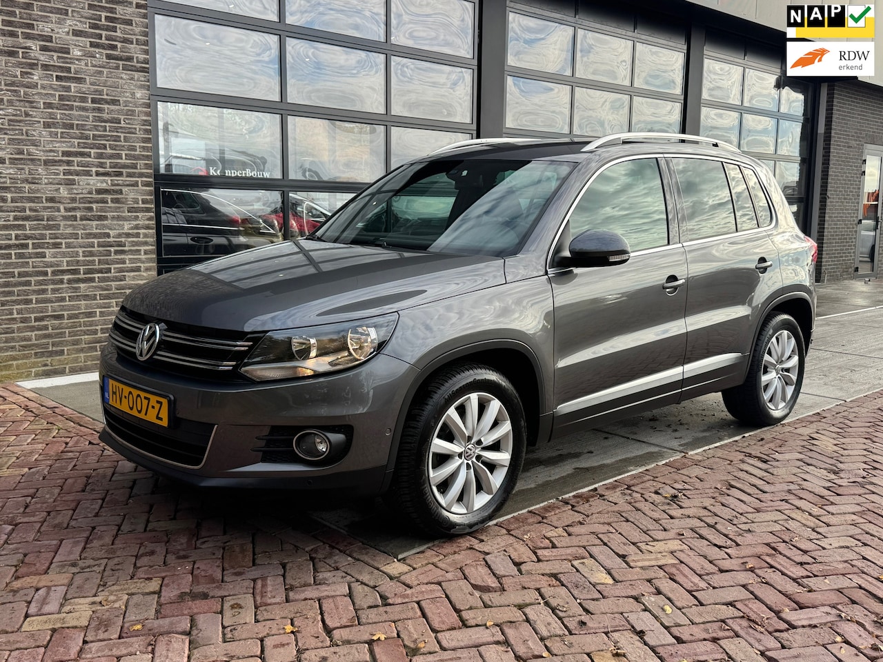 Volkswagen Tiguan - 1.4 TSI Sport&Style | Alcantara | Clima | Cruise | PDC | - AutoWereld.nl