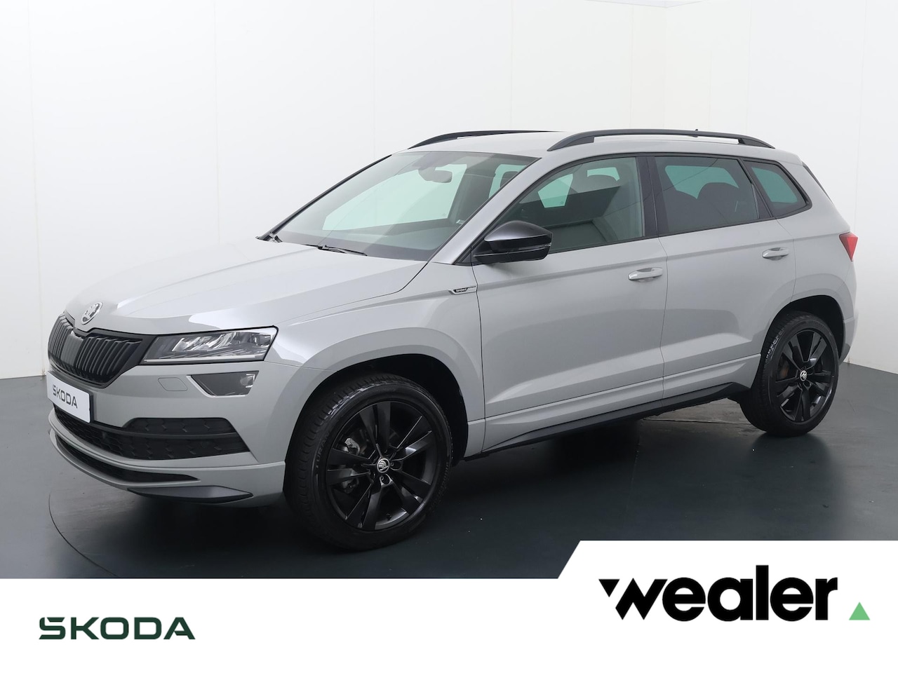 Skoda Karoq - 1.5 TSI ACT Sportline Business | 150 PK | Automaat | Navigatiesysteem | Sportstoelen | 18" - AutoWereld.nl