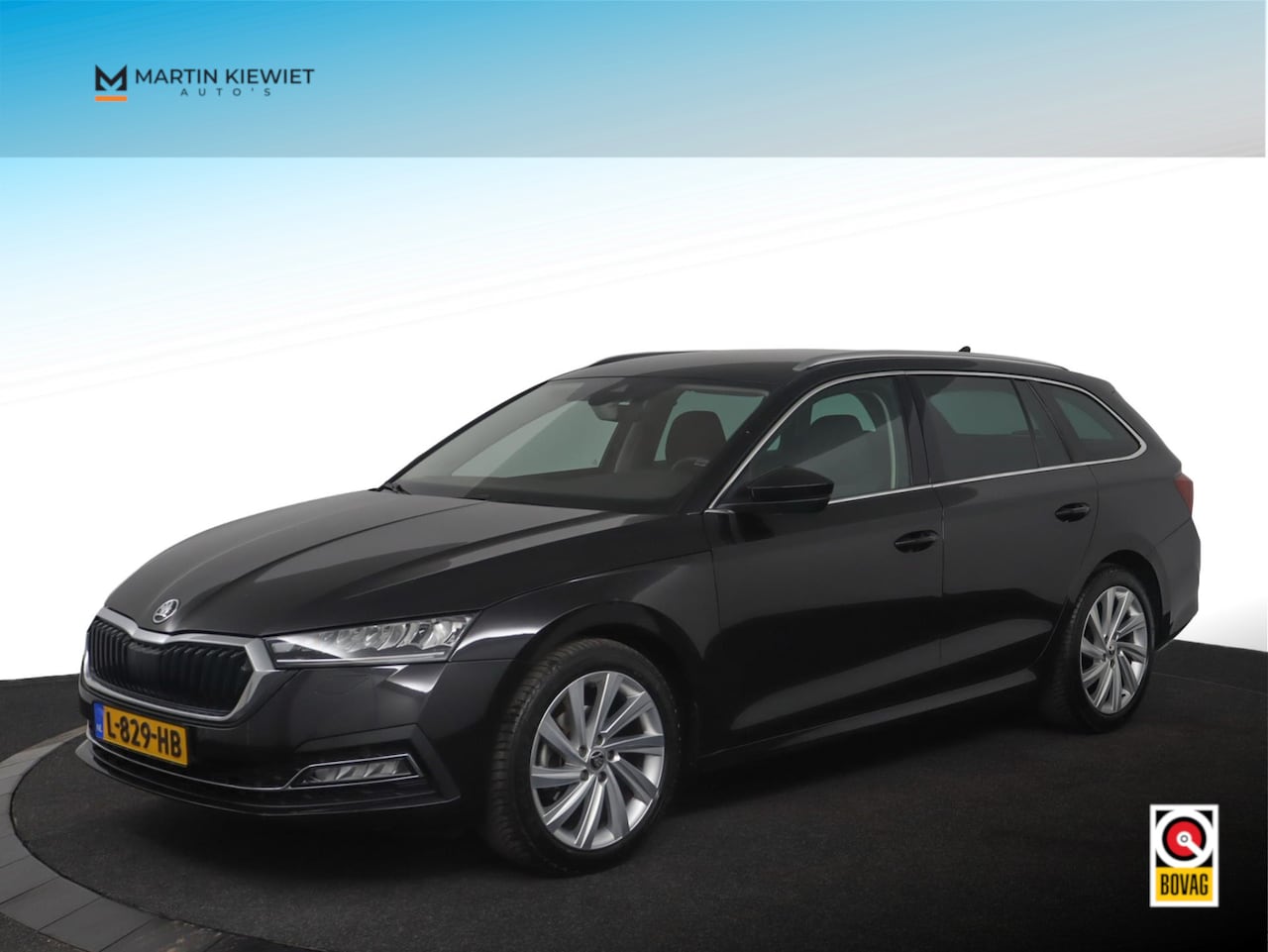 Skoda Octavia Combi - 1.0 e-TSI Business Edition Plus|18"|Camera|Stoelverwarming - AutoWereld.nl