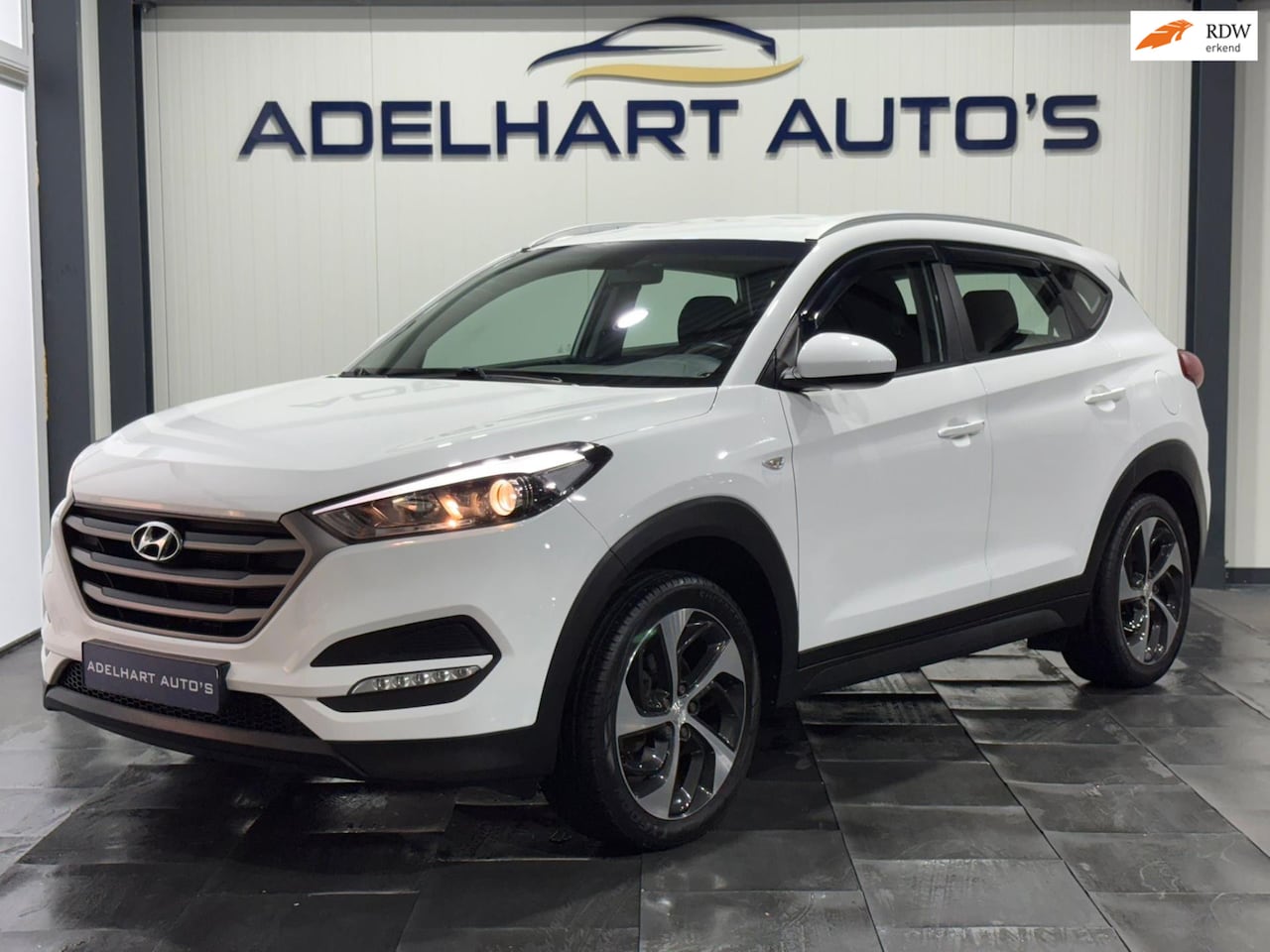 Hyundai Tucson - 1.6 GDi Premium / Navigatie full map / Camera / Cruise control - AutoWereld.nl