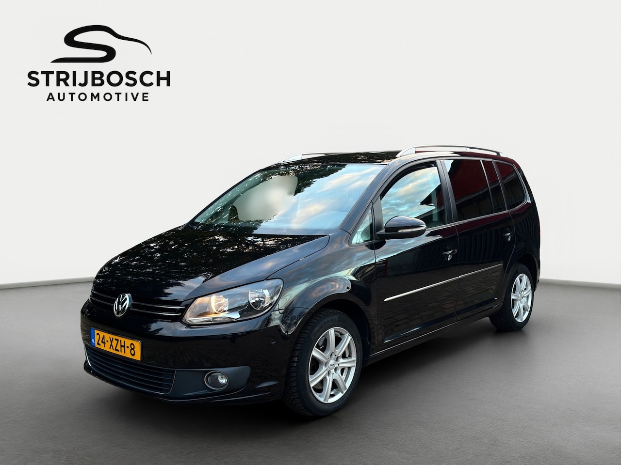 Volkswagen Touran - 1.4 TSI DSG Aut. Highline | NETTO € 7.143,- | Navi | Clima | Trekhaak - AutoWereld.nl