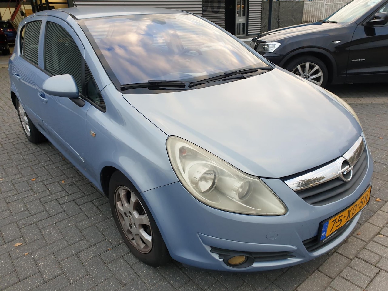 Opel Corsa - 1.4-16V Enjoy 1.4-16V Enjoy - AutoWereld.nl