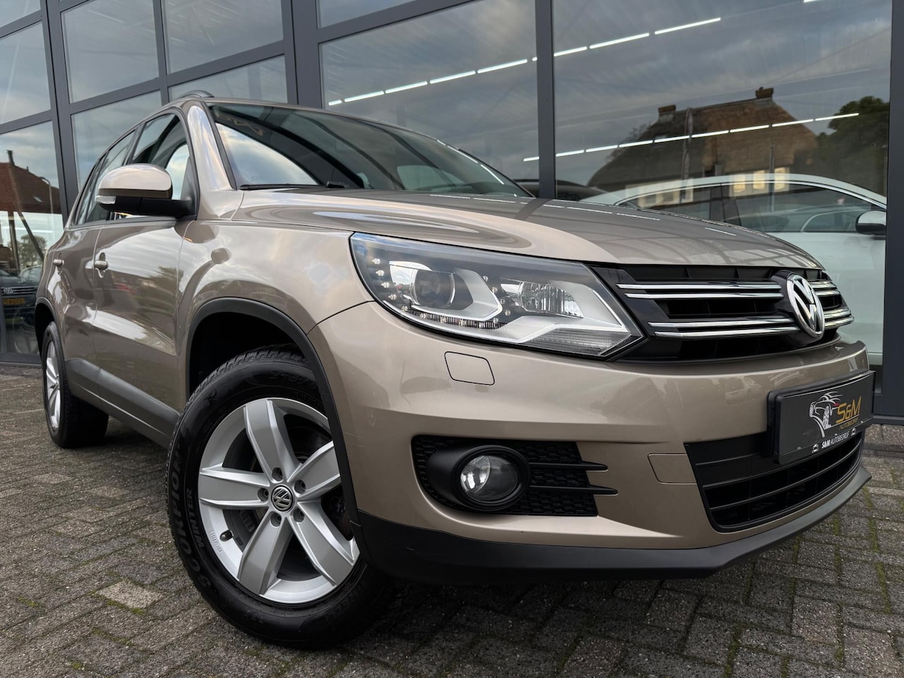 Volkswagen Tiguan - 2.0 TSI Sport&Style 4Motion | Pano. | Camera - AutoWereld.nl