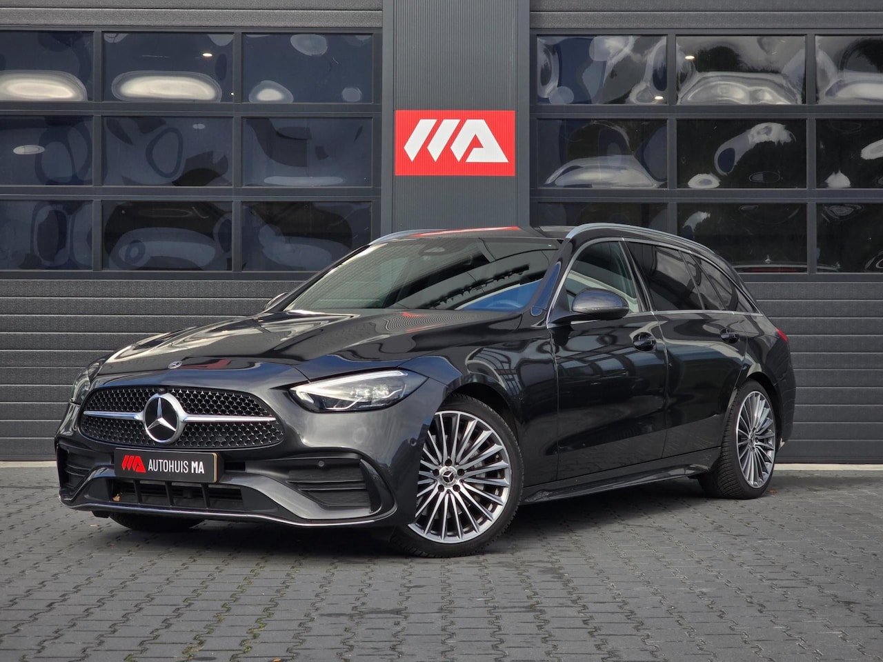 Mercedes-Benz C-klasse Estate - 180 AMG Line Cruise/Camera/Navi/Trekhaak - AutoWereld.nl