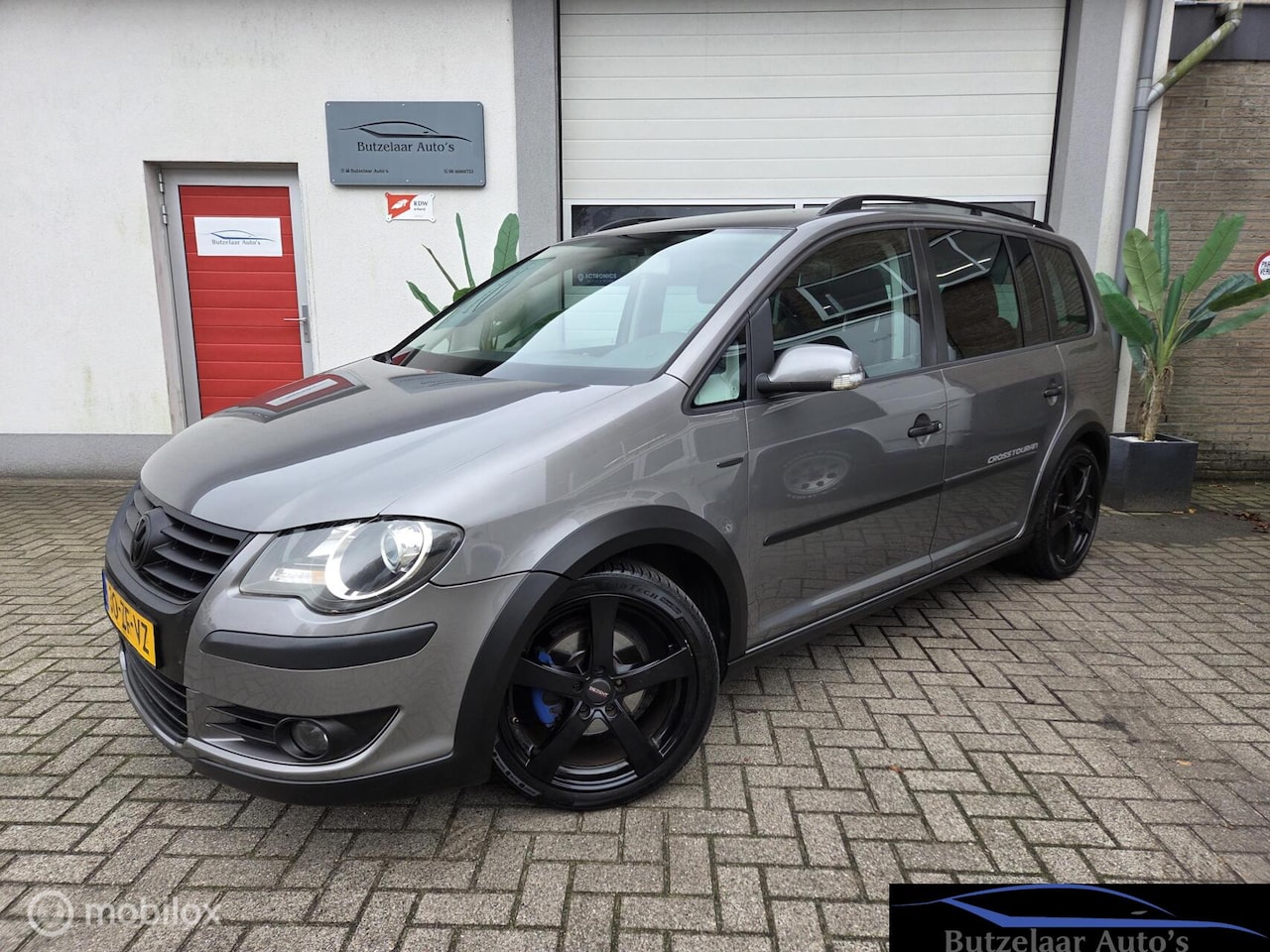 Volkswagen Touran Cross - 1.4 TSI Verlaagd | 17 inch | 5Pers. - AutoWereld.nl