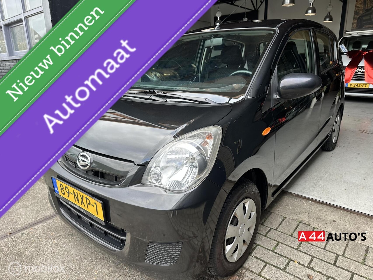 Daihatsu Cuore - 1.0 Comfort*AUTOMAAT*NL AUTO NAP✅*62447 KM* - AutoWereld.nl