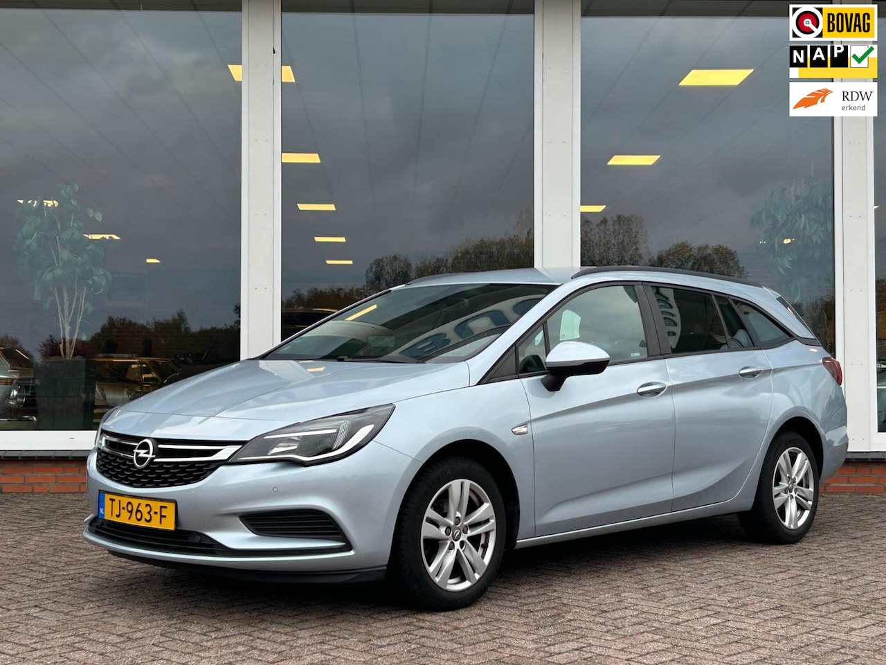 Opel Astra Sports Tourer - 1.4 Online Edition - Origineel NL - NAP - Navi - PDC - Trekhaak - AutoWereld.nl