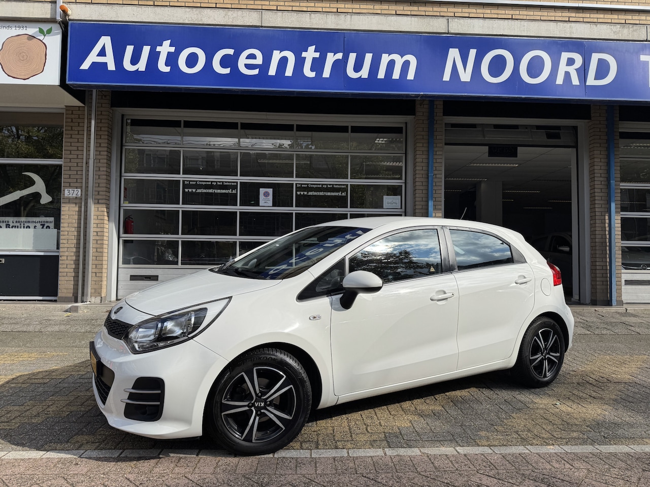 Kia Rio - 1.2 CVVT ComfortLine 61683KM! NAP | 1e Eigenaar | Airco | Cruise Control | Dealeronderhoud - AutoWereld.nl