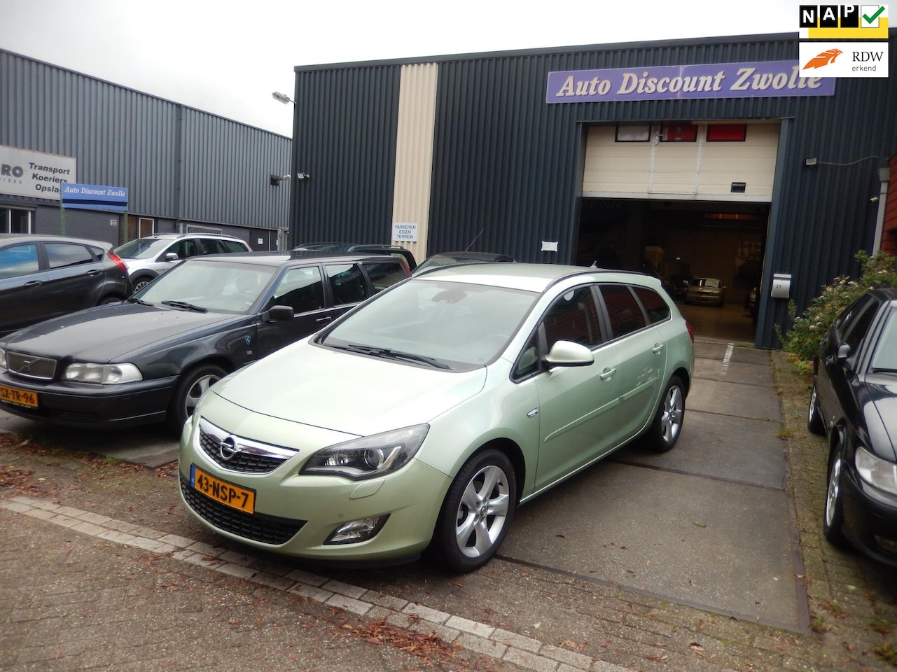 Opel Astra Sports Tourer - 1.4 Turbo Edition NAVI AIRCO - AutoWereld.nl