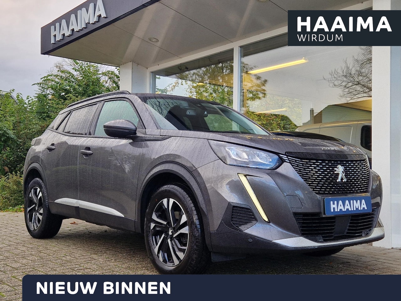 Peugeot 2008 - 1.2 PureTech Allure Pack | Climate & Adaptive Cruise Control | 3D-Cockpit | Stoelverwarmin - AutoWereld.nl