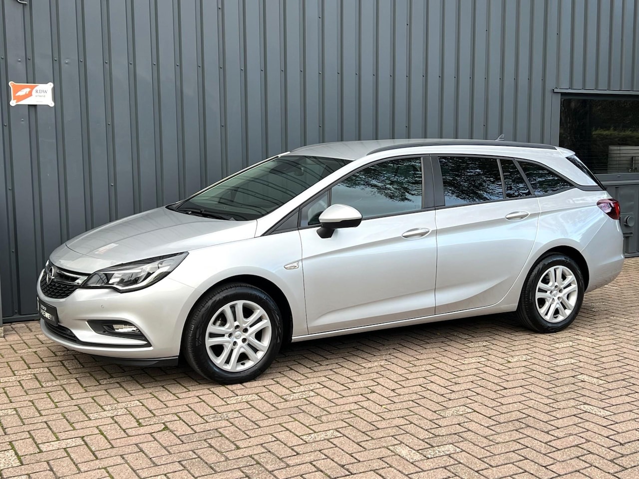 Opel Astra Sports Tourer - Business Executive CARPLAY!/ONDERHOUDEN!/APK!/ - AutoWereld.nl